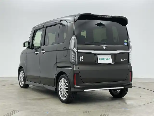 ホンダ Ｎ ＢＯＸ カスタム L ターボ 岡山県 2021(令3)年 2.7万km プレミアムグラマラスブロンズP 純正８インチナビ　(VXU-217NBi)/(CD/DVD/BT/USB/フルセグ)/レーダークルーズコントロール　/両側電動スライドドア　/ＬＥＤヘッドライト　/シートヒーター　前席/ビルトインＥＴＣ　/純正ドライブレコーダー　前後/バックカメラ　/コーナーセンサー　後/オートハイビーム　/LEDフォグランプ/禁煙車/アイドリングストップ/純正アルミホイール/パドルシフト/踏み間違い防止