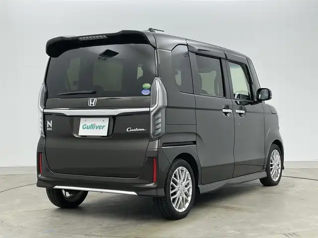 ホンダ Ｎ ＢＯＸ カスタム L ターボ 岡山県 2021(令3)年 2.7万km プレミアムグラマラスブロンズP 純正８インチナビ　(VXU-217NBi)/(CD/DVD/BT/USB/フルセグ)/レーダークルーズコントロール　/両側電動スライドドア　/ＬＥＤヘッドライト　/シートヒーター　前席/ビルトインＥＴＣ　/純正ドライブレコーダー　前後/バックカメラ　/コーナーセンサー　後/オートハイビーム　/LEDフォグランプ/禁煙車/アイドリングストップ/純正アルミホイール/パドルシフト/踏み間違い防止