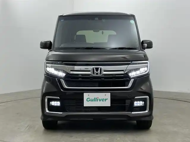 ホンダ Ｎ ＢＯＸ カスタム L ターボ 岡山県 2021(令3)年 2.7万km プレミアムグラマラスブロンズP 純正８インチナビ　(VXU-217NBi)/(CD/DVD/BT/USB/フルセグ)/レーダークルーズコントロール　/両側電動スライドドア　/ＬＥＤヘッドライト　/シートヒーター　前席/ビルトインＥＴＣ　/純正ドライブレコーダー　前後/バックカメラ　/コーナーセンサー　後/オートハイビーム　/LEDフォグランプ/禁煙車/アイドリングストップ/純正アルミホイール/パドルシフト/踏み間違い防止