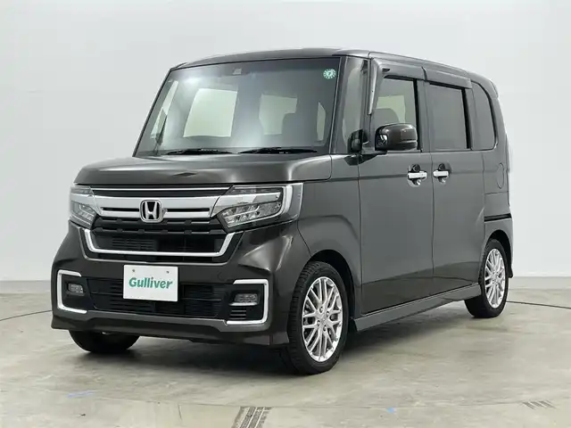 ホンダ Ｎ ＢＯＸ カスタム L ターボ 岡山県 2021(令3)年 2.7万km プレミアムグラマラスブロンズP 純正８インチナビ　(VXU-217NBi)/(CD/DVD/BT/USB/フルセグ)/レーダークルーズコントロール　/両側電動スライドドア　/ＬＥＤヘッドライト　/シートヒーター　前席/ビルトインＥＴＣ　/純正ドライブレコーダー　前後/バックカメラ　/コーナーセンサー　後/オートハイビーム　/LEDフォグランプ/禁煙車/アイドリングストップ/純正アルミホイール/パドルシフト/踏み間違い防止