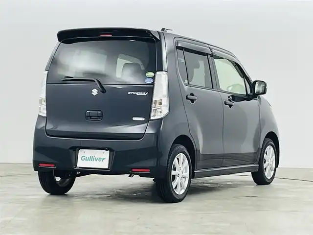 スズキ ワゴンＲ スティングレー X 福島県 2013(平25)年 3.5万km ブルーイッシュブラックパール3 安全装備/・衝突軽減ブレーキ/・車両走行安定補助システム/・誤発進抑制機能/・エマージェンシーストップシグナル/社外ＳＤナビ（AVN-133M）/・ワンセグＴＶ/・バックカメラ/・ＣＤ　/・AM/FM/前方ドライブレコーダー/冬タイヤ社外ホイール積込（同サイズ）/純正ホイール/フロアマット/サイドバイザー/ベンチシート/オートライト/フォグランプ/アイドリングストップ/スマートキー/プッシュスタート