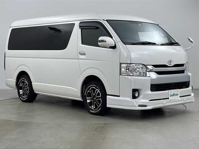 トヨタ ハイエース GL 道央・札幌 2015(平27)年 7.1万km ホワイトパールクリスタルシャイン ・4WD/・ワンオーナー/・社外ナビ/CD/DVD/SD/BT/フルセグ/・バックカメラ/・片側パワースライドドア/・社外フリップダウンモニター/・後席ベットキット/・ステアリングスイッチ/・社外ステアリングスイッチ/・社外エアロ/・社外フロアマット/・社外シートカバー/・100V/100W/・LEDヘッドライト/・LEDフォグランプ/・スマートキー/・スペアキー/・社外AWマッドタイヤ