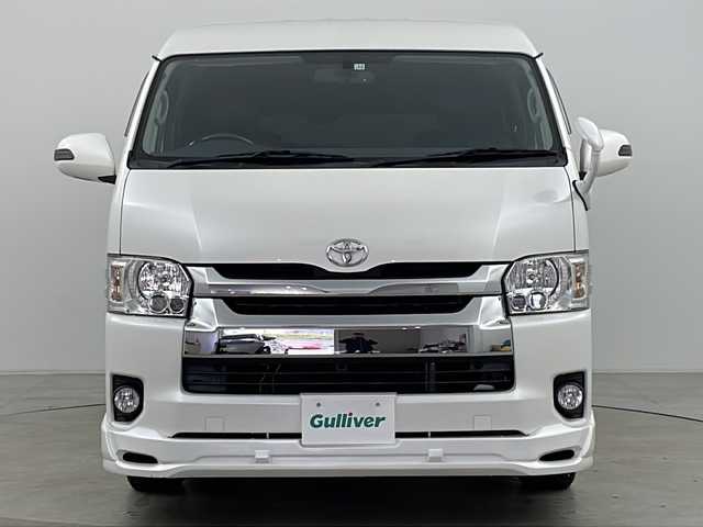 トヨタ ハイエース GL 道央・札幌 2015(平27)年 7.1万km ホワイトパールクリスタルシャイン ・4WD/・ワンオーナー/・社外ナビ/CD/DVD/SD/BT/フルセグ/・バックカメラ/・片側パワースライドドア/・社外フリップダウンモニター/・後席ベットキット/・ステアリングスイッチ/・社外ステアリングスイッチ/・社外エアロ/・社外フロアマット/・社外シートカバー/・100V/100W/・LEDヘッドライト/・LEDフォグランプ/・スマートキー/・スペアキー/・社外AWマッドタイヤ
