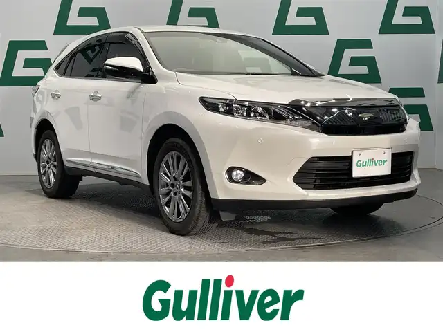 トヨタ ハリアー プレミアム 鹿児島県 2015(平27)年 4.4万km ホワイトパールクリスタルシャイン 禁煙車　/純正ナビ(CD/DVD/フルセグTV/Bluetooth)　/トヨタセーフティセンス/前後コーナーセンサー　/クルーズコントロール　/バックカメラ　/LEDヘッドライト　/運転席パワーシート　/パワーバックドア　/純正フロアマット　/オートライト　/オートマチックハイビーム　/ドライブレコーダー/ETC/ドアバイザー/電格ミラー