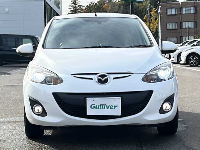 マツダ デミオ 13－スカイA Sスター グレイス 石川県 2013(平25)年 4.4万km クリスタルホワイトパールマイカ ワンオーナー/社外SDナビゲーション/【Bluetooth・フルセグTV・CD・DVD・SD】/バックカメラ/ナビ内蔵前方ドライブレコーダー/LEDヘッドランプ/・オートライト/・フォグランプ/スマートキー/ETC/ステアリングリモコン/横滑り防止装置/アイドリングストップ/アイドリングストップ/保証書/取扱説明書