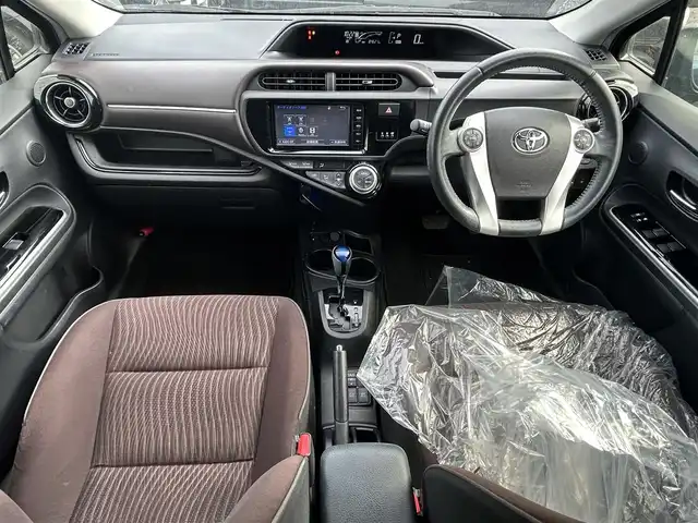 トヨタ アクア G 宮崎県 2015(平27)年 8.5万km ダークバイオレットマイカメタリック (株)IDOMが運営する【じしゃロン宮崎店】の自社ローン対象車両になります。こちらは現金ご利用時の価格です。/自社ローンご希望の方は別途その旨お申付け下さい。//ナビ(NSZT-W64)//TV/CD/DVD/Bluetooth//バックカメラ//前席シートヒーター//クルーズコントロール//純正フロアマット//ドアバイザー//オートライト//ステアリングスイッチ//取扱説明書//保証書