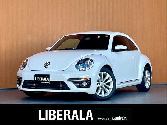 フォルクスワーゲン ザ・ビートル デザイン 愛知県 2018(平30)年 6万km ピュアホワイト 純正ナビ/フルセグTV/CD/DVD再生/Bluetooth/ブラインドスポットアシスト/クルーズコントロール/HIDヘッドライト/スマートキー/プッシュスタート/オートライト/ヘッドライトレベライザー/純正17インチアルミ/ETC