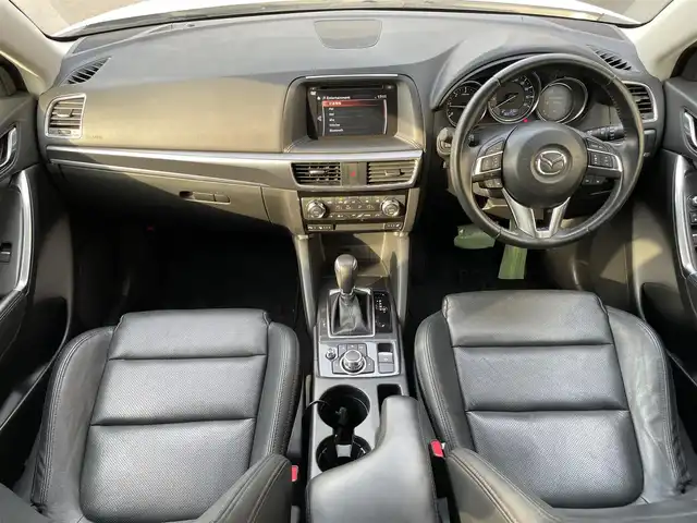 マツダ ＣＸ－５ XD Lパッケージ 滋賀県 2016(平28)年 3.7万km クリスタルホワイトパールマイカ 禁煙車/純正ナビ/（BT/CD/DVD/AUX/フルセグ）/バック・サイドカメラ/前後ドライブレコーダー/ビルトインETC/シートヒーター/フロントエアロ/衝突被害軽減ブレーキ/レーンキープアシスト/レーダークルーズコントロール/本革シート/パワーシート/メモリシート/オートエアコン/アイドリングストップ/コーナーセンサー/ステアリングスイッチ/電動パーキング/オートライト/電動格納ミラー/フォグランプ/MT付AT