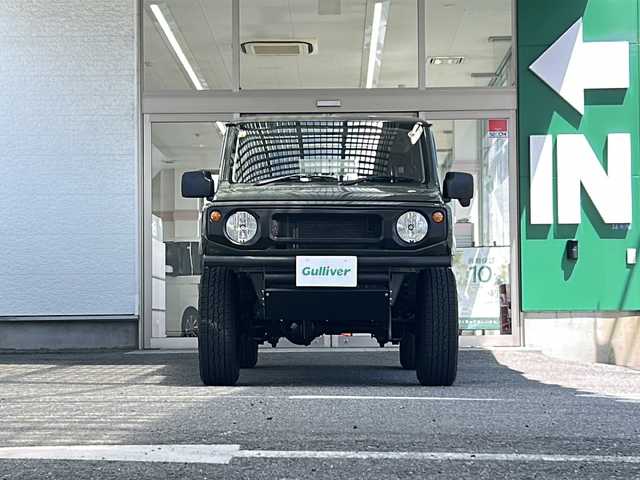 スズキ ジムニー XG 兵庫県 2020(令2)年 2.6万km ジャングルグリーン 1オーナー/禁煙車/デジタルインナーミラー（ドラレコ・Bカメラ機能付）/合皮シートカバー/Ｂｌｕｅｔｏｏｔｈ接続可能オーディオ：ＭＶＨ－６６００　/ＵＳＢ入力端子/純正AW/社外マフラー/社外フロントバンパー/社外リアバンパー/社外フロントグリル/社外マット/純正バイザー/保証書/取扱説明書/記録簿R5