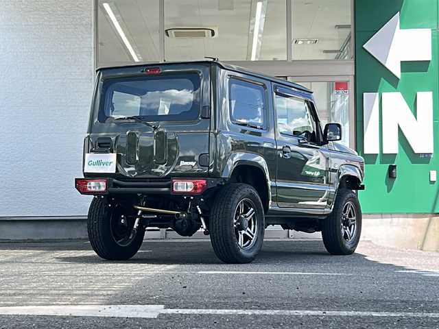 スズキ ジムニー XG 兵庫県 2020(令2)年 2.6万km ジャングルグリーン 1オーナー/禁煙車/デジタルインナーミラー（ドラレコ・Bカメラ機能付）/合皮シートカバー/Ｂｌｕｅｔｏｏｔｈ接続可能オーディオ：ＭＶＨ－６６００　/ＵＳＢ入力端子/純正AW/社外マフラー/社外フロントバンパー/社外リアバンパー/社外フロントグリル/社外マット/純正バイザー/保証書/取扱説明書/記録簿R5