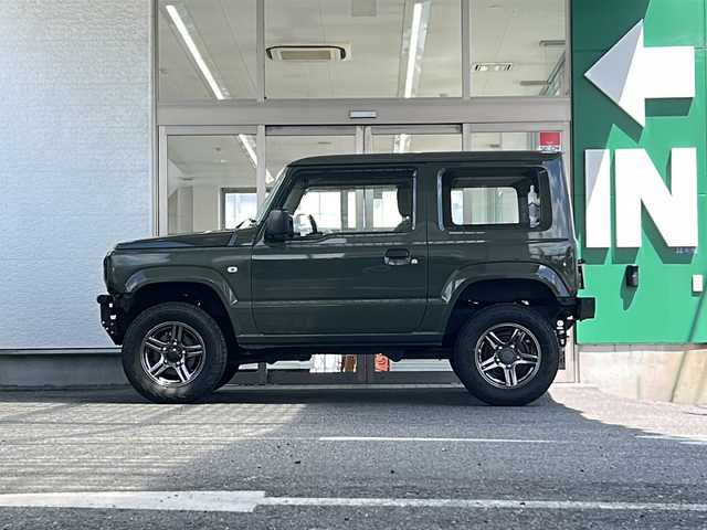 スズキ ジムニー XG 兵庫県 2020(令2)年 2.6万km ジャングルグリーン 1オーナー/禁煙車/デジタルインナーミラー（ドラレコ・Bカメラ機能付）/合皮シートカバー/Ｂｌｕｅｔｏｏｔｈ接続可能オーディオ：ＭＶＨ－６６００　/ＵＳＢ入力端子/純正AW/社外マフラー/社外フロントバンパー/社外リアバンパー/社外フロントグリル/社外マット/純正バイザー/保証書/取扱説明書/記録簿R5