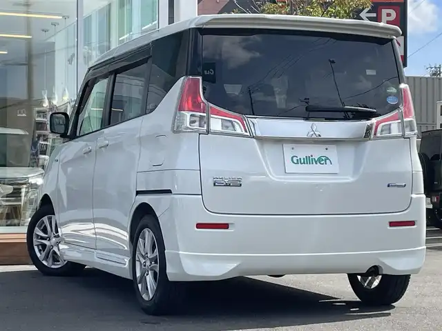 三菱 デリカＤ：２ ハイブリッドMZ 道央・札幌 2018(平30)年 7.1万km ピュアホワイトP ・４WD/・衝突軽減ブレーキ/・ワンオーナー/・社外ナビ/　CD＆BT＆USB＆TV/・レーンキープアシスト/・両側パワースライドドア/・クルーズコントロール/・オートエアコン/・オートライト/・アイドリングストップ/・ミラーヒーター/・シートヒーター/・ドライブレコーダー/・プッシュスタート/・スマートキー/・電動格納ミラー/・純正フロアマット/・ドアバイザー/・ウィンカーミラー/・フォグライト/・HIDヘッドライト/・スペアキー