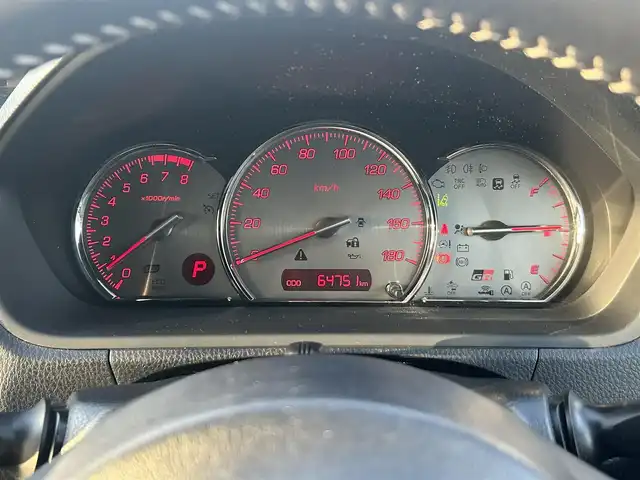 トヨタ ヴォクシー ZS GRスポーツ 奈良県 2020(令2)年 6.5万km ホワイトパールクリスタルシャイン 登録時走行距離64751km/純正10インチナビ/フルセグTV(AM.FM.CD.DVD.TV.BT)/純正フリップダウンモニター/両側パワースライドドア/バックカメラ/ETC/ドライブレコーダー/シートヒーター/クリアランスソナー/衝突軽減ブレーキ/横滑り防止装置/クルーズコントロール(追従走行なし)/車線逸脱警報（レーンキープアシスト）/オートライト/オートマチックハイビーム/アイドリングストップ/18インチ純正AW/純正フロアマット/ハーフレザーシート