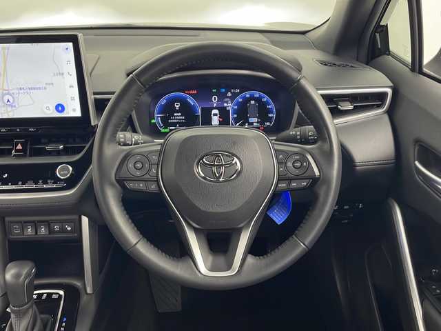 トヨタ カローラ クロス ハイブリッド Z 秋田県 2024(令6)年 0.7万km アティチュードブラックマイカ 4WD/純正ナビ/（AM/FM/TV/Bluetooth）/レーダークルーズコントロール/ビルトインETC2.0/ハーフレザーシート/ワイパーデアイサー/前席シートヒーター/ステアリングヒーター/革巻きステアリング/ルーフレール/オートライト/オートマチックハイビーム/LEDヘッドライト/フォグランプ/トヨタセーフティーセンス/アドバンスパーク/衝突軽減システム/レーンキープアシスト/ブラインドスポットモニター/パワーバックドア