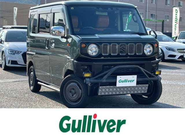 スズキ エブリィ ワゴン PZターボ 広島県 2020(令2)年 3.3万km クールカーキPM ワンオーナー/禁煙車/ジムニーフェイスキット/フロントバンパーガード/社外バンパー/リフトアップ/サイドカバー/社外マフラー/社外ナビ/　【CD/DVD/Bluetooth/フルセグTV】/衝突被害軽減システム/横滑防止装置/盗難防止装置/片側パワースライドドア/D席シートヒーター/レザー調シートカバー/ETC/デジタルインナーミラー/ロットホルダー/純正シリコンカバー/社外ラゲッジトレイ/純正ドアハンドルエスカレッション/フェンダーミラー/オートライト/LEDヘッドライト/社外フォグランプ/プッシュスタート/スマートキー/スペアキー×1/アイドリングストップ/社外アルミホイール 14インチ/ドアバイザー/純正フロアマット/新車時整備手帳（保証書）/取扱説明書