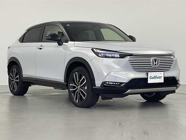 ホンダ ヴェゼル ハイブリッド e:HEV PLaY 岐阜県 2024(令6)年 1.1万km プレミアムサンライトホワイトパール パノラマルーフ/マルチビューモニター/9インチHondaCONNECTディスプレイ/ナビ/フルセグTV/Bluetooth/USB/AppleCarPlay/ワイヤレス充電/ハーフレザーシート/シートヒーター/パワーバックドア/プッシュスタート/スマートキー/フロアマット/衝突軽減ブレーキ/誤発進抑制機能（前方・後方）/近距離衝突軽減ブレーキ/歩行者事故低減ステアリング/路外逸脱抑制機能/渋滞追従機能付きアダプティブクルーズコントロール/車線維持支援システム/先行車発進お知らせ機能/標識認識機能/オートハイビーム/ブラインドスポットインフォメーション/LEDアクティブコーナリングライト