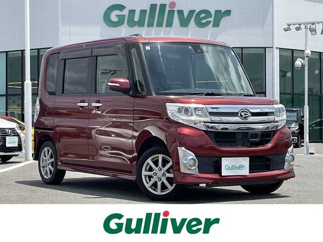 ダイハツ タント カスタム X SAⅡ 佐賀県 2015(平27)年 15.6万km ファイアークォーツレッドM 純正メモリーナビゲーション/・AM/FM/Bluetooth/CD/DVD/フルセグTV/・バックカメラ/片側パワースライドドア/後席サンシェード/前後ドライブレコーダー/LEDヘッドライト/プッシュスタート/スマートキー/革巻きステアリング/ETC/純正14インチアルミホイール/純正フロアマット/純正ドアバイザー/スペアキー1本/スマートアシスト/・衝突被害ブレーキ/・コーナーセンサー