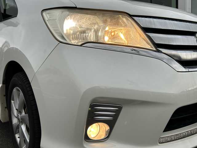 日産 セレナ ハイウェイスター Vセレクション 鹿児島県 2012(平24)年 10.8万km ブリリアントホワイトパール 純正ナビ/　　CD/DVD/BT/フルセグ/バックカメラ/両側パワースライドドア/クルーズコントロール/オートライト/純正16インチアルミホイール/ステアリングスイッチ/リアオートエアコン/アイドリングストップ/ヒルスタートアシスト/後席サンシェード/スマートキー/ETC