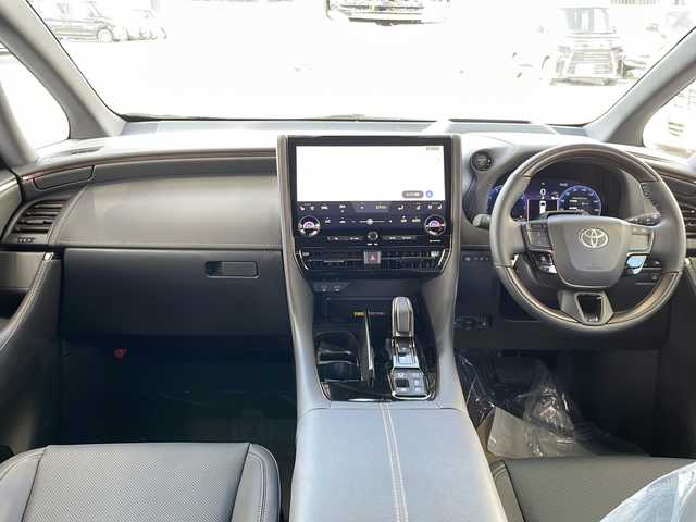 トヨタ アルファードハイブリット Z 愛知県 2025(令7)年 0.1千km プラチナホワイトパールマイカ ワンオーナー/14インチディスプレイオーディオプラス/【コネクティッドナビ対応・フルセグTV・AM/FM・USB入力・HDMI入力・AppleCarPlay・AndrodiAuto】/ETC2.0/左右独立ムーンルーフ/デジタルインナーミラー/パワーシート（前席）/・マイコンプリセットドライビングポジションシステム/助手席肩口パワーシートスイッチ/2列目エグゼクティブパワーシート/【パワーリクライニング・大型ヘッドレスト・快適温熱シート・充電用USB端子・パワーオットマン・折り畳み式サイドテーブル・大型アームレスト】/セーフティセンス（予防安全パッケージ）/【プリクラッシュセーフティ・レーントレーシングアシスト・レーンディパーチャーアラート・全車速追従機能付レーダークルーズコントロール・アダプティブハイビームシステム・ロードサインアシスト】/トヨタチームメイト/カラーヘッドアップディスプレイ/・タッチトレーサーオペレーション/ユニバーサルステップ/グローブボックス照明/おくだけ充電/床下透過表示機能付パノラミックビューモニター/3眼LEDヘッドライトランプ/新車保証書/スペアキー