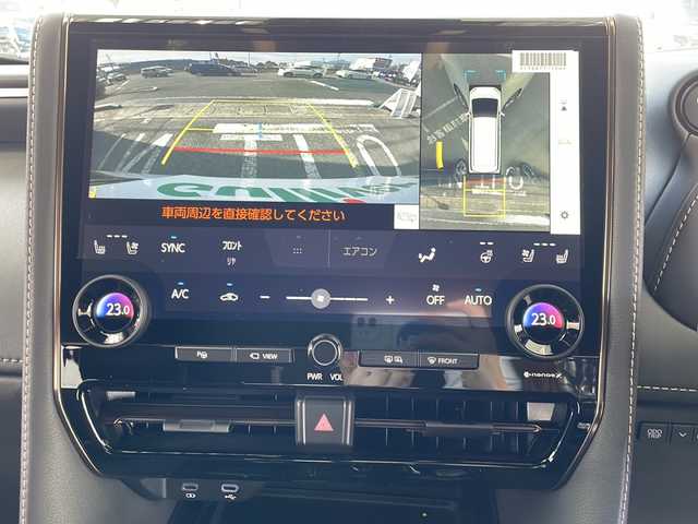 トヨタ アルファードハイブリット Z 愛知県 2025(令7)年 0.1千km プラチナホワイトパールマイカ ワンオーナー/14インチディスプレイオーディオプラス/【コネクティッドナビ対応・フルセグTV・AM/FM・USB入力・HDMI入力・AppleCarPlay・AndrodiAuto】/ETC2.0/左右独立ムーンルーフ/デジタルインナーミラー/パワーシート（前席）/・マイコンプリセットドライビングポジションシステム/助手席肩口パワーシートスイッチ/2列目エグゼクティブパワーシート/【パワーリクライニング・大型ヘッドレスト・快適温熱シート・充電用USB端子・パワーオットマン・折り畳み式サイドテーブル・大型アームレスト】/セーフティセンス（予防安全パッケージ）/【プリクラッシュセーフティ・レーントレーシングアシスト・レーンディパーチャーアラート・全車速追従機能付レーダークルーズコントロール・アダプティブハイビームシステム・ロードサインアシスト】/トヨタチームメイト/カラーヘッドアップディスプレイ/・タッチトレーサーオペレーション/ユニバーサルステップ/グローブボックス照明/おくだけ充電/床下透過表示機能付パノラミックビューモニター/3眼LEDヘッドライトランプ/新車保証書/スペアキー