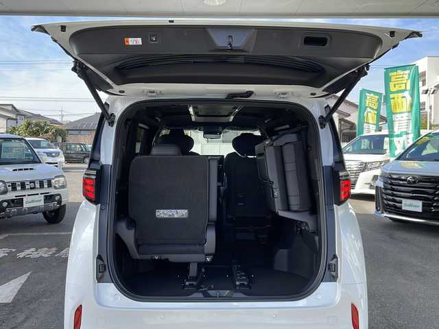 トヨタ アルファードハイブリット Z 愛知県 2025(令7)年 0.1千km プラチナホワイトパールマイカ ワンオーナー/14インチディスプレイオーディオプラス/【コネクティッドナビ対応・フルセグTV・AM/FM・USB入力・HDMI入力・AppleCarPlay・AndrodiAuto】/ETC2.0/左右独立ムーンルーフ/デジタルインナーミラー/パワーシート（前席）/・マイコンプリセットドライビングポジションシステム/助手席肩口パワーシートスイッチ/2列目エグゼクティブパワーシート/【パワーリクライニング・大型ヘッドレスト・快適温熱シート・充電用USB端子・パワーオットマン・折り畳み式サイドテーブル・大型アームレスト】/セーフティセンス（予防安全パッケージ）/【プリクラッシュセーフティ・レーントレーシングアシスト・レーンディパーチャーアラート・全車速追従機能付レーダークルーズコントロール・アダプティブハイビームシステム・ロードサインアシスト】/トヨタチームメイト/カラーヘッドアップディスプレイ/・タッチトレーサーオペレーション/ユニバーサルステップ/グローブボックス照明/おくだけ充電/床下透過表示機能付パノラミックビューモニター/3眼LEDヘッドライトランプ/新車保証書/スペアキー