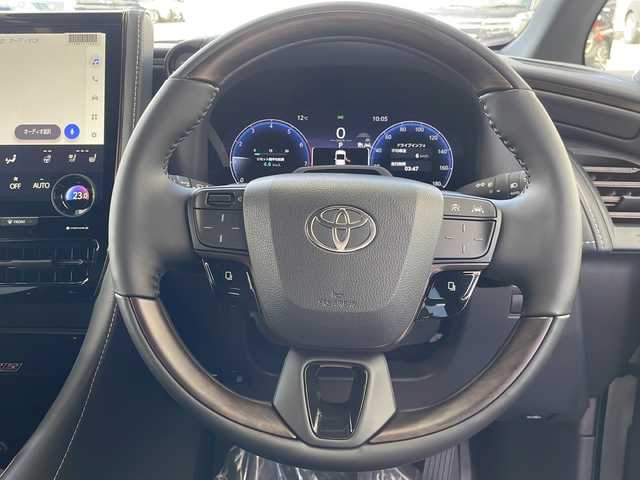 トヨタ アルファードハイブリット Z 愛知県 2025(令7)年 0.1千km プラチナホワイトパールマイカ ワンオーナー/14インチディスプレイオーディオプラス/【コネクティッドナビ対応・フルセグTV・AM/FM・USB入力・HDMI入力・AppleCarPlay・AndrodiAuto】/ETC2.0/左右独立ムーンルーフ/デジタルインナーミラー/パワーシート（前席）/・マイコンプリセットドライビングポジションシステム/助手席肩口パワーシートスイッチ/2列目エグゼクティブパワーシート/【パワーリクライニング・大型ヘッドレスト・快適温熱シート・充電用USB端子・パワーオットマン・折り畳み式サイドテーブル・大型アームレスト】/セーフティセンス（予防安全パッケージ）/【プリクラッシュセーフティ・レーントレーシングアシスト・レーンディパーチャーアラート・全車速追従機能付レーダークルーズコントロール・アダプティブハイビームシステム・ロードサインアシスト】/トヨタチームメイト/カラーヘッドアップディスプレイ/・タッチトレーサーオペレーション/ユニバーサルステップ/グローブボックス照明/おくだけ充電/床下透過表示機能付パノラミックビューモニター/3眼LEDヘッドライトランプ/新車保証書/スペアキー