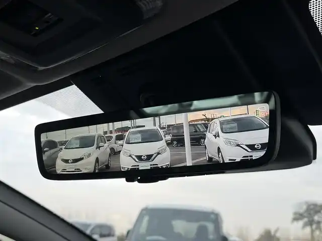 トヨタ プリウス Z 奈良県 2025(令7)年 1.3万km プラチナホワイトパールマイカ モデリスタエアロ/純正12インチディスプレイオーディオ/（TV/BT/AppleCarPlay/AndroidAuto）/レーダークルーズコントロール/アラウンドビューモニター/ブラインドスポットモニター/前後コーナーセンサー/プリクラッシュセーフティ/レーンキープアシスト/パーキングアシスト/パワーバックドア/レザーシート/運転席メモリ付きパワーシート/前席シートヒーター/エアーシート/ステアリングヒーター/ワイヤレス充電/デジタルインナーミラー/LEDヘッドライト/ETC2.0/純正19インチAW/保証書/取り扱い説明書