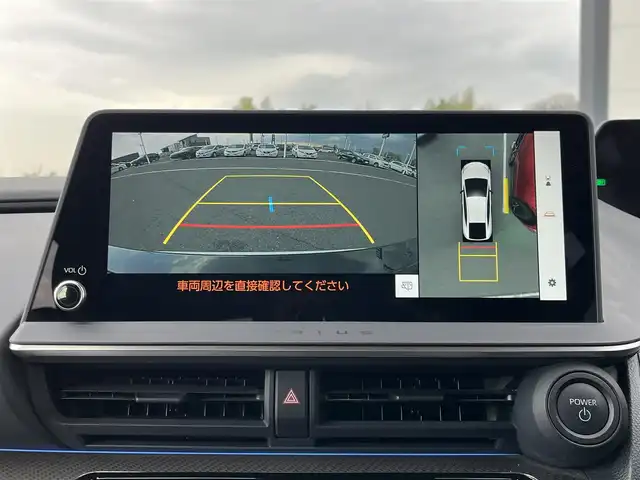 トヨタ プリウス Z 奈良県 2025(令7)年 1.3万km プラチナホワイトパールマイカ モデリスタエアロ/純正12インチディスプレイオーディオ/（TV/BT/AppleCarPlay/AndroidAuto）/レーダークルーズコントロール/アラウンドビューモニター/ブラインドスポットモニター/前後コーナーセンサー/プリクラッシュセーフティ/レーンキープアシスト/パーキングアシスト/パワーバックドア/レザーシート/運転席メモリ付きパワーシート/前席シートヒーター/エアーシート/ステアリングヒーター/ワイヤレス充電/デジタルインナーミラー/LEDヘッドライト/ETC2.0/純正19インチAW/保証書/取り扱い説明書