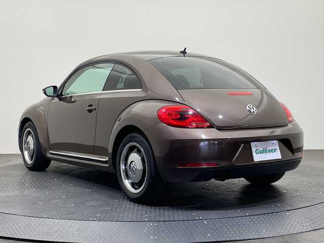 フォルクスワーゲン ザ・ビートル チョコ 愛媛県 2014(平26)年 8万km 茶 社外７インチナビ/Bluetooth/ワンセグテレビ/ドライブレコーダー/ETC/プッシュスタート/LEDヘッドライト/オートライト/フォグランプ/電動格納ミラー