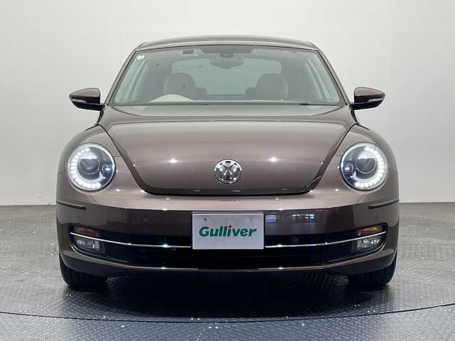 フォルクスワーゲン ザ・ビートル チョコ 愛媛県 2014(平26)年 8万km 茶 社外７インチナビ/Bluetooth/ワンセグテレビ/ドライブレコーダー/ETC/プッシュスタート/LEDヘッドライト/オートライト/フォグランプ/電動格納ミラー