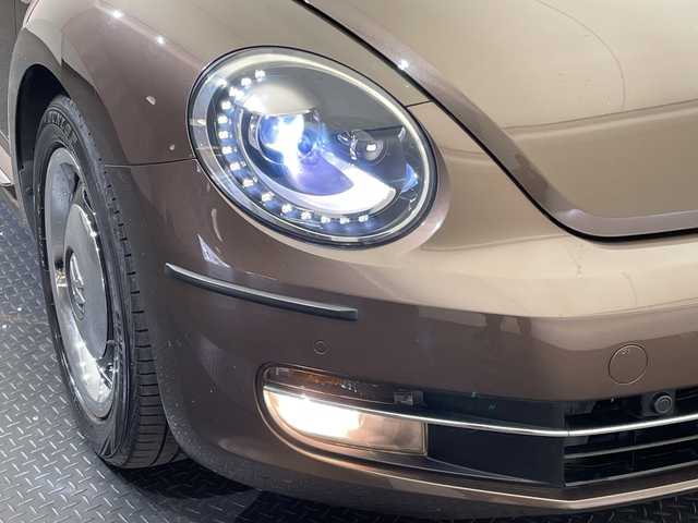 フォルクスワーゲン ザ・ビートル チョコ 愛媛県 2014(平26)年 8万km 茶 社外７インチナビ/Bluetooth/ワンセグテレビ/ドライブレコーダー/ETC/プッシュスタート/LEDヘッドライト/オートライト/フォグランプ/電動格納ミラー