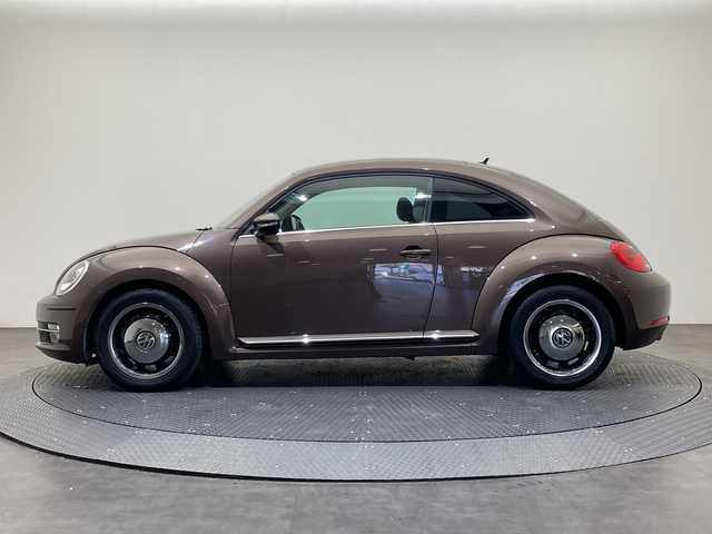 フォルクスワーゲン ザ・ビートル チョコ 愛媛県 2014(平26)年 8万km 茶 社外７インチナビ/Bluetooth/ワンセグテレビ/ドライブレコーダー/ETC/プッシュスタート/LEDヘッドライト/オートライト/フォグランプ/電動格納ミラー