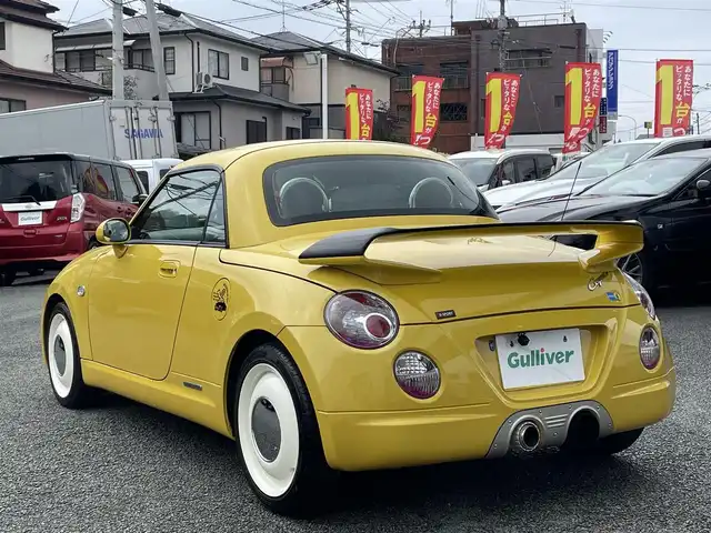 ダイハツ コペン ULTIMATE Ⅱ メモリアル 熊本県 2007(平19)年 10.8万km ジョーヌイエロー ディスプレイオーディオ/【Bluetooth再生】/MOMOステアリング/リアスポイラー/社外マフラー（BE FREE）/バックカメラ/レザーシート/運転席・助手席シートヒーター/社外15インチアルミホイール/HIDライト/ETC/HKSエアーインテーク/電動オープン動作確認済み