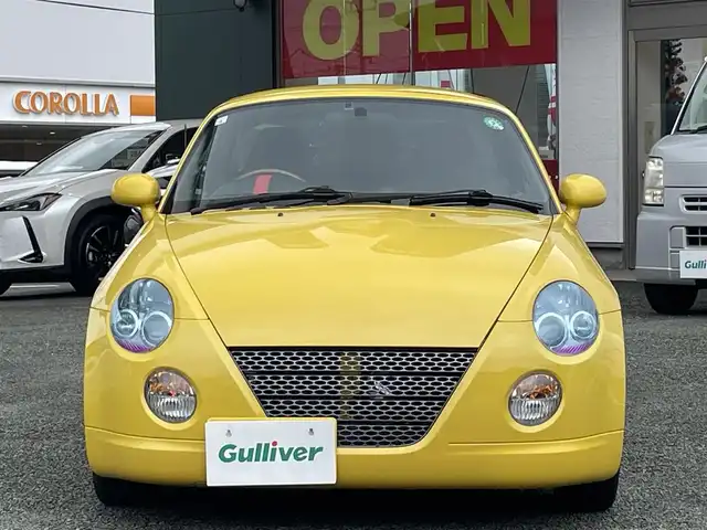 ダイハツ コペン ULTIMATE Ⅱ メモリアル 熊本県 2007(平19)年 10.8万km ジョーヌイエロー ディスプレイオーディオ/【Bluetooth再生】/MOMOステアリング/リアスポイラー/社外マフラー（BE FREE）/バックカメラ/レザーシート/運転席・助手席シートヒーター/社外15インチアルミホイール/HIDライト/ETC/HKSエアーインテーク/電動オープン動作確認済み