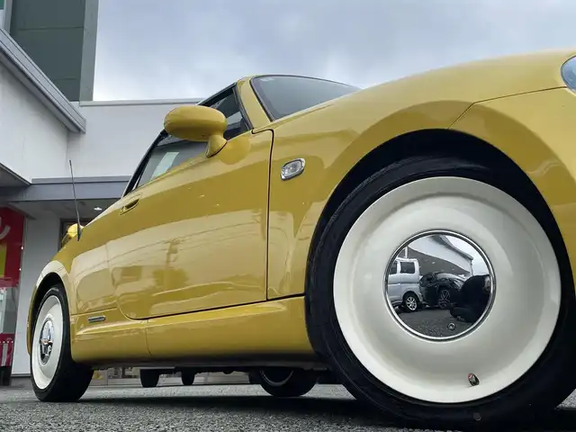 ダイハツ コペン ULTIMATE Ⅱ メモリアル 熊本県 2007(平19)年 10.8万km ジョーヌイエロー ディスプレイオーディオ/【Bluetooth再生】/MOMOステアリング/リアスポイラー/社外マフラー（BE FREE）/バックカメラ/レザーシート/運転席・助手席シートヒーター/社外15インチアルミホイール/HIDライト/ETC/HKSエアーインテーク/電動オープン動作確認済み