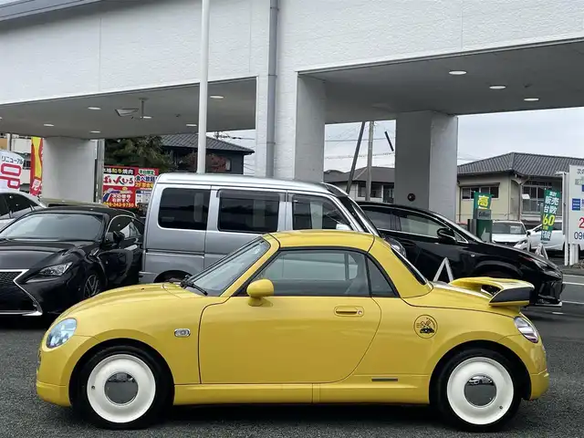 ダイハツ コペン ULTIMATE Ⅱ メモリアル 熊本県 2007(平19)年 10.8万km ジョーヌイエロー ディスプレイオーディオ/【Bluetooth再生】/MOMOステアリング/リアスポイラー/社外マフラー（BE FREE）/バックカメラ/レザーシート/運転席・助手席シートヒーター/社外15インチアルミホイール/HIDライト/ETC/HKSエアーインテーク/電動オープン動作確認済み