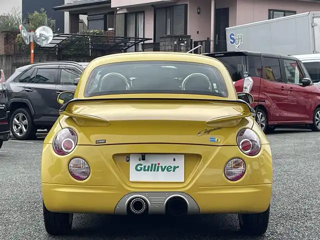 ダイハツ コペン ULTIMATE Ⅱ メモリアル 熊本県 2007(平19)年 10.8万km ジョーヌイエロー ディスプレイオーディオ/【Bluetooth再生】/MOMOステアリング/リアスポイラー/社外マフラー（BE FREE）/バックカメラ/レザーシート/運転席・助手席シートヒーター/社外15インチアルミホイール/HIDライト/ETC/HKSエアーインテーク/電動オープン動作確認済み