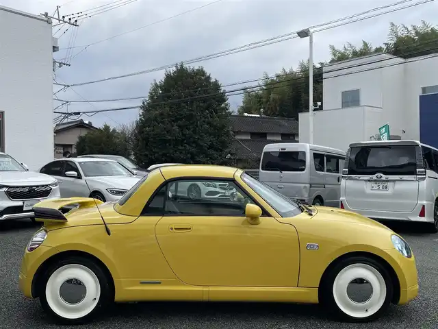 ダイハツ コペン ULTIMATE Ⅱ メモリアル 熊本県 2007(平19)年 10.8万km ジョーヌイエロー ディスプレイオーディオ/【Bluetooth再生】/MOMOステアリング/リアスポイラー/社外マフラー（BE FREE）/バックカメラ/レザーシート/運転席・助手席シートヒーター/社外15インチアルミホイール/HIDライト/ETC/HKSエアーインテーク/電動オープン動作確認済み