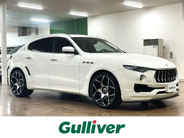 マセラティ レヴァンテ S 道央・札幌 2017(平29)年 3.9万km ビアンコ 4WD/純正ナビ/・ワンセグTV/BT/SD/USB/AM/FM/バックカメラ/全方位カメラ/サンルーフ/赤革シート/全席シートヒーター/前席パワーシート/運転席シートメモリ機能/社外前後ドライブレコーダー/社外レーダー/横滑り防止装置/オートクルーズコントロール/ビルトインETC/ブラインドスポットモニター/前後コーナーセンサー/プッシュスタート/スマートキー/オートライト/LEDヘッドライト/前後フォグライト/ウインカーミラー/カーテンエアバッグ/ルーフレール/トノカバー/NOVITEC製22インチAW/NOVITEC製フルエアロ/取扱説明書