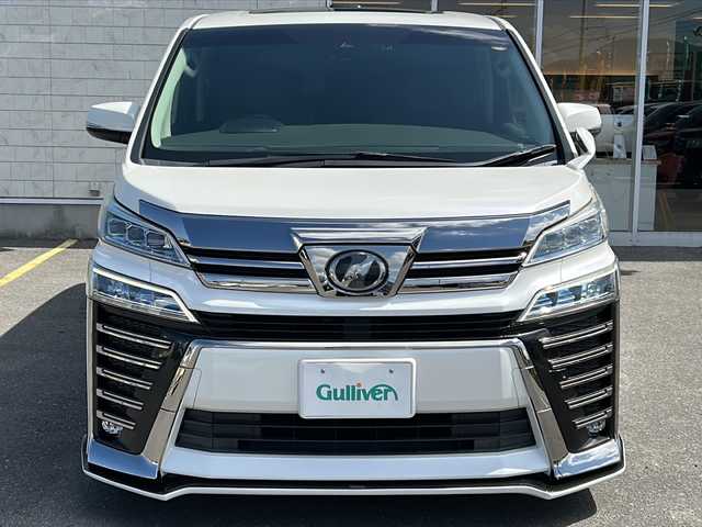 トヨタ ヴェルファイア Z Gエディション 香川県 2018(平30)年 6.3万km ホワイトパールクリスタルシャイン ダブルサンルーフ/両側パワースライドドア/純正10インチナビ/ーBlueTooth接続/ーフルセグTV/ーCD/DVD再生/ーHDMI接続/純正フリップダウンモニター/3眼LEDヘッドライト/シーケンシャルウィンカー/トヨタセーフティセンス/レーダークルーズコントロール/純正ビルトインETC2.0/ALPINEデジタルインナーミラー型ドラレコ（フロント、室内）/パワーシート/シートヒーター/ベンチレーション/メモリーシート/ステアリングスイッチ/ステアリングヒーター/コンビハンドル/ダウンサス（純正サス社内積み込み）/フロントアンダーエアロ