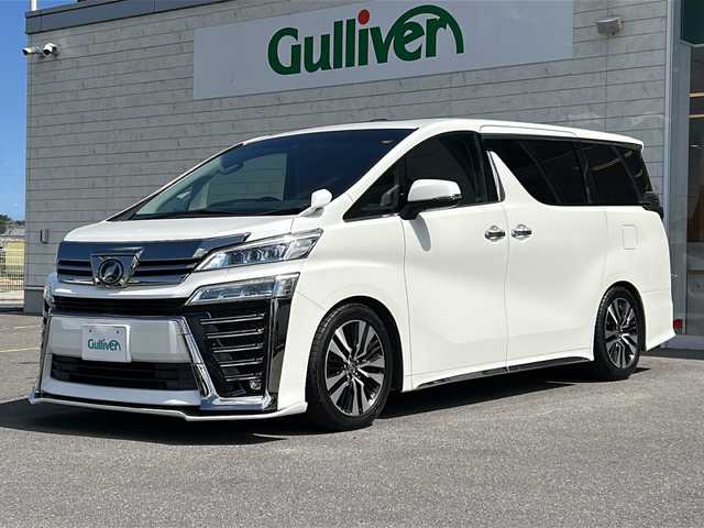 トヨタ ヴェルファイア Z Gエディション 香川県 2018(平30)年 6.3万km ホワイトパールクリスタルシャイン ダブルサンルーフ/両側パワースライドドア/純正10インチナビ/ーBlueTooth接続/ーフルセグTV/ーCD/DVD再生/ーHDMI接続/純正フリップダウンモニター/3眼LEDヘッドライト/シーケンシャルウィンカー/トヨタセーフティセンス/レーダークルーズコントロール/純正ビルトインETC2.0/ALPINEデジタルインナーミラー型ドラレコ（フロント、室内）/パワーシート/シートヒーター/ベンチレーション/メモリーシート/ステアリングスイッチ/ステアリングヒーター/コンビハンドル/ダウンサス（純正サス社内積み込み）/フロントアンダーエアロ