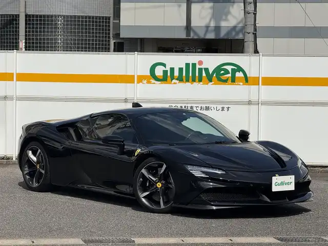 フェラーリ フェラーリ ＳＦ９０ ストラダーレ 愛知県 2021(令3)年 0.7万km 黒 /正規ディーラー車//禁煙車//CORNES記録簿R4.5.6//ネロ・デイトナ//LHD//DCTギアボックス//カーボンファイバー製フロントウィング/サイドエアスプリッタ//カーボンファイバーリアディフューザー/アンダーカバー//LED付きカーボンファイバー製ドライブゾーン//サスペンションリフター//20インチダイヤモンド研磨仕上げスポーツホイール//ミシュランパイロットスポーツCup2//ブラックブレーキキャリパー//カーボンセラミックブレーキ//AFSヘッドライトシステム//アクティブエアロダイナミックス//跳馬刺繍ヘッドレスト//スペシャルカラードステッチ//スクーデリアフェラーリフェンダーエンブレム//パワーManettino//eDrive/HV/Performance/Qualifing//ESP//CT/RACE/SPORT/WET//サテライトナビ//Bluetooth/USB//インフォティメントシステム//リアパーキングカメラ//ビルトインETC2.0//ドラレコ//レーダー探知機//黒革シート/パワーシート//マトリクスLED//アクティブビームコントロール//シフトタイミングライト//パーキングセンサー//HUD//ADAS//クルコン/AHB//EPB/スピードリミッター//充電ケーブル//スペアキー//保証書/取扱説明書