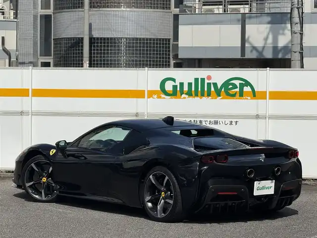 フェラーリ フェラーリ ＳＦ９０ ストラダーレ 愛知県 2021(令3)年 0.7万km 黒 /正規ディーラー車//禁煙車//CORNES記録簿R4.5.6//ネロ・デイトナ//LHD//DCTギアボックス//カーボンファイバー製フロントウィング/サイドエアスプリッタ//カーボンファイバーリアディフューザー/アンダーカバー//LED付きカーボンファイバー製ドライブゾーン//サスペンションリフター//20インチダイヤモンド研磨仕上げスポーツホイール//ミシュランパイロットスポーツCup2//ブラックブレーキキャリパー//カーボンセラミックブレーキ//AFSヘッドライトシステム//アクティブエアロダイナミックス//跳馬刺繍ヘッドレスト//スペシャルカラードステッチ//スクーデリアフェラーリフェンダーエンブレム//パワーManettino//eDrive/HV/Performance/Qualifing//ESP//CT/RACE/SPORT/WET//サテライトナビ//Bluetooth/USB//インフォティメントシステム//リアパーキングカメラ//ビルトインETC2.0//ドラレコ//レーダー探知機//黒革シート/パワーシート//マトリクスLED//アクティブビームコントロール//シフトタイミングライト//パーキングセンサー//HUD//ADAS//クルコン/AHB//EPB/スピードリミッター//充電ケーブル//スペアキー//保証書/取扱説明書