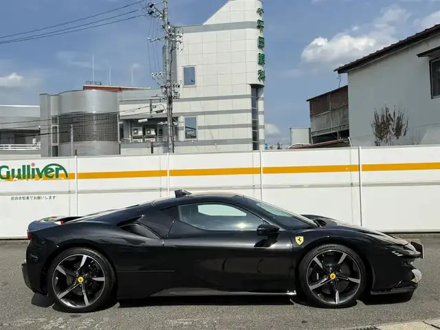 フェラーリ フェラーリ ＳＦ９０ ストラダーレ 愛知県 2021(令3)年 0.7万km 黒 /正規ディーラー車//禁煙車//CORNES記録簿R4.5.6//ネロ・デイトナ//LHD//DCTギアボックス//カーボンファイバー製フロントウィング/サイドエアスプリッタ//カーボンファイバーリアディフューザー/アンダーカバー//LED付きカーボンファイバー製ドライブゾーン//サスペンションリフター//20インチダイヤモンド研磨仕上げスポーツホイール//ミシュランパイロットスポーツCup2//ブラックブレーキキャリパー//カーボンセラミックブレーキ//AFSヘッドライトシステム//アクティブエアロダイナミックス//跳馬刺繍ヘッドレスト//スペシャルカラードステッチ//スクーデリアフェラーリフェンダーエンブレム//パワーManettino//eDrive/HV/Performance/Qualifing//ESP//CT/RACE/SPORT/WET//サテライトナビ//Bluetooth/USB//インフォティメントシステム//リアパーキングカメラ//ビルトインETC2.0//ドラレコ//レーダー探知機//黒革シート/パワーシート//マトリクスLED//アクティブビームコントロール//シフトタイミングライト//パーキングセンサー//HUD//ADAS//クルコン/AHB//EPB/スピードリミッター//充電ケーブル//スペアキー//保証書/取扱説明書