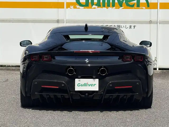 フェラーリ フェラーリ ＳＦ９０ ストラダーレ 愛知県 2021(令3)年 0.7万km 黒 /正規ディーラー車//禁煙車//CORNES記録簿R4.5.6//ネロ・デイトナ//LHD//DCTギアボックス//カーボンファイバー製フロントウィング/サイドエアスプリッタ//カーボンファイバーリアディフューザー/アンダーカバー//LED付きカーボンファイバー製ドライブゾーン//サスペンションリフター//20インチダイヤモンド研磨仕上げスポーツホイール//ミシュランパイロットスポーツCup2//ブラックブレーキキャリパー//カーボンセラミックブレーキ//AFSヘッドライトシステム//アクティブエアロダイナミックス//跳馬刺繍ヘッドレスト//スペシャルカラードステッチ//スクーデリアフェラーリフェンダーエンブレム//パワーManettino//eDrive/HV/Performance/Qualifing//ESP//CT/RACE/SPORT/WET//サテライトナビ//Bluetooth/USB//インフォティメントシステム//リアパーキングカメラ//ビルトインETC2.0//ドラレコ//レーダー探知機//黒革シート/パワーシート//マトリクスLED//アクティブビームコントロール//シフトタイミングライト//パーキングセンサー//HUD//ADAS//クルコン/AHB//EPB/スピードリミッター//充電ケーブル//スペアキー//保証書/取扱説明書