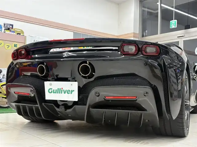 フェラーリ フェラーリ ＳＦ９０ ストラダーレ 愛知県 2021(令3)年 0.7万km 黒 /正規ディーラー車//禁煙車//CORNES記録簿R4.5.6//ネロ・デイトナ//LHD//DCTギアボックス//カーボンファイバー製フロントウィング/サイドエアスプリッタ//カーボンファイバーリアディフューザー/アンダーカバー//LED付きカーボンファイバー製ドライブゾーン//サスペンションリフター//20インチダイヤモンド研磨仕上げスポーツホイール//ミシュランパイロットスポーツCup2//ブラックブレーキキャリパー//カーボンセラミックブレーキ//AFSヘッドライトシステム//アクティブエアロダイナミックス//跳馬刺繍ヘッドレスト//スペシャルカラードステッチ//スクーデリアフェラーリフェンダーエンブレム//パワーManettino//eDrive/HV/Performance/Qualifing//ESP//CT/RACE/SPORT/WET//サテライトナビ//Bluetooth/USB//インフォティメントシステム//リアパーキングカメラ//ビルトインETC2.0//ドラレコ//レーダー探知機//黒革シート/パワーシート//マトリクスLED//アクティブビームコントロール//シフトタイミングライト//パーキングセンサー//HUD//ADAS//クルコン/AHB//EPB/スピードリミッター//充電ケーブル//スペアキー//保証書/取扱説明書