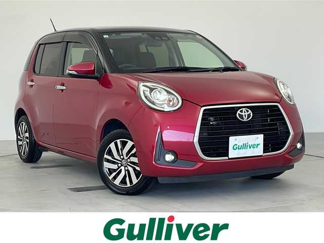トヨタ パッソ モーダ　Gパッケージ 愛知県 2019(令1)年 6万km ブラックマイカ/マゼンダベリーメタリック 純正ディーラーオプションナビ/(AM/FM/CD/SD/BT/フルセグ)/ドライブレコーダー/ＥＴＣ/シートヒーター/トヨタセーフティセンス/(PCS/AHB/クリアランスソナー)/アイドリングストップ/横滑り防止装置/電動格納ミラー/ISOFIX/オートライト/フォグランプ/ステアリングスイッチ/プッシュスタート/スマートキー/スペアキー/純正ドアバイザー/純正フロアマット/純正１４インチアルミホイール/取扱説明書/保証書