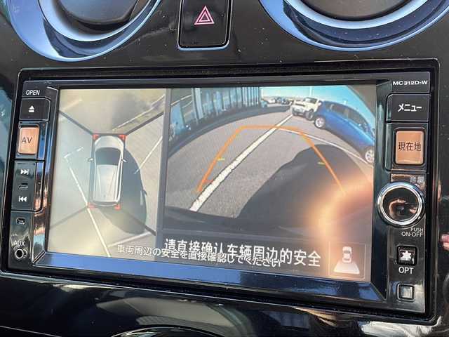 日産 ノート メダリスト 新潟県 2013(平25)年 4.1万km 茶 ワンオーナー/全方位カメラ/純正ナビ　MC312D‐W/　〈BT／AM／FM／DVD〉/シガーソケット/ドアバイザー/電格ミラー/リモコンキー/　〈スペア2本〉/社外ホイール14インチ/　〈BALMINUM〉