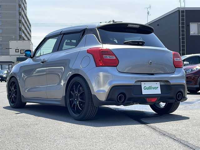 スズキ スイフト スポーツ 道北・旭川 2018(平30)年 9.8万km プレミアムシルバーメタリック 社外ディスプレイオーディオ(CD/DVD/BT)/バックカメラ/オートライト/横滑り防止/シートヒーター/ETC/前後ドライブレコーダー/スパルコステアリング/スマートキー/プッシュスタート/ウィンカーミラー/フォグ/フロアマット/ドアバイザー/保証書/取説/スペアキー