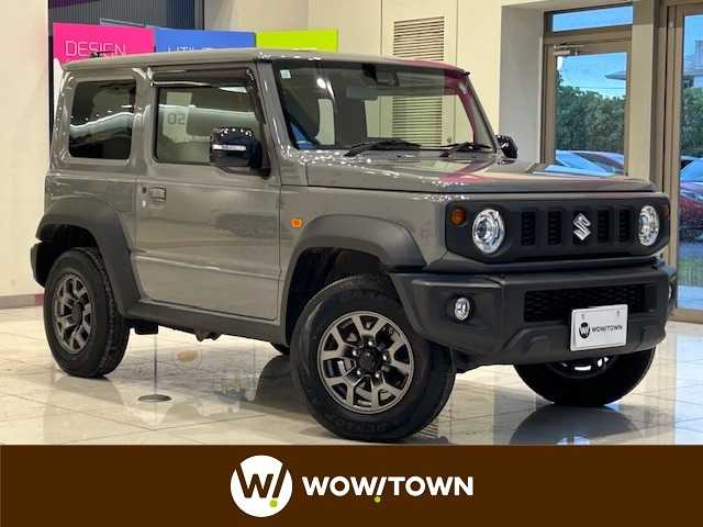 スズキ ジムニー シエラ JC 埼玉県 2023(令5)年 0.9万km ミディアムグレー スズキセーフティサポート/社外ディスプレイオーディオ/　　BT/AM/FM/クルーズコントロール/LEDオートライト/シートヒーター/純正15インチAW/アイドリングストップ/スペアキー/プッシュスタート/禁煙車